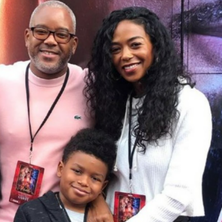 Ananda Lewis with her husband, Harry Smith and her son, Langston.